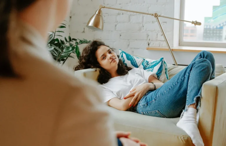 Relationship counseling session with a professional therapist helping couples improve communication and resolve conflicts.